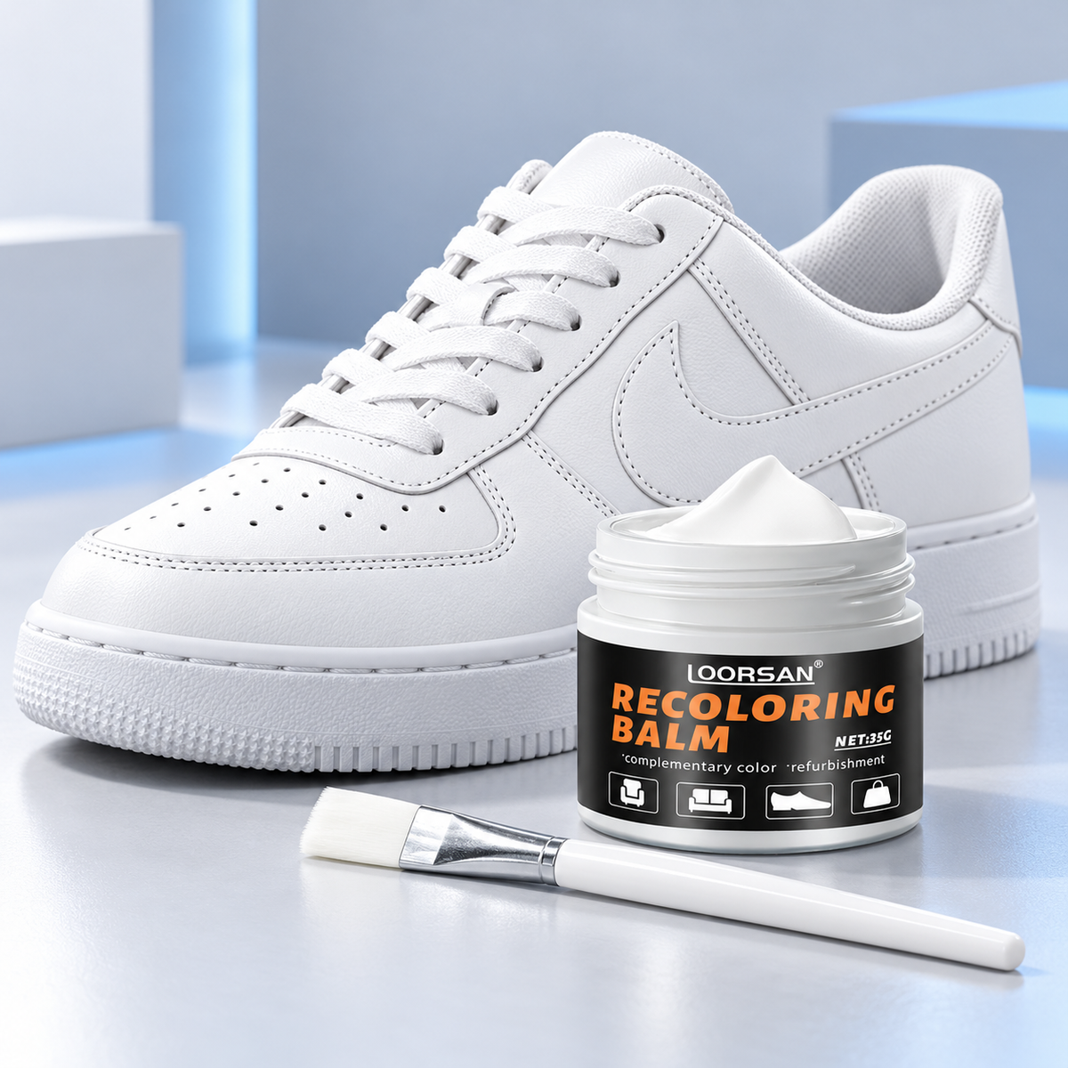 White shoe restorer cream with applicator brush and white sneaker